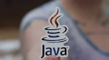 A woman on the background holding a java logo on her fingers.
