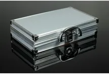 A metalic closed hand luggage for documents.