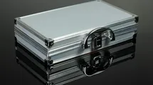 A metalic closed hand luggage for documents.